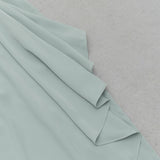 SOLID BATWING SLEEVE WRAP HEM DRESS
