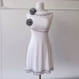 Alara White One-Shoulder Chiffon Mini Dress with Black Trim & Floral Appliques