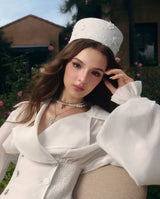 zenobia Large lapel button puff sleeve tutu mini dress in white