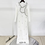white long sleeve embellished maxi dress