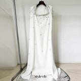red nail bead chain shawl sleeves floor-length dress