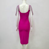 CRYSTAL BANDAGE MIDI DRESS IN HOT PINK