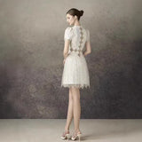 Henrietta Ivory Sequin Mini Dress with Mesh Panels