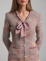 xylia bow v-neck long sleeve mini dress in multicolor