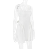 BACKLESS BOW MINI DRESS IN IVORY