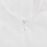 BACKLESS BOW MINI DRESS IN IVORY