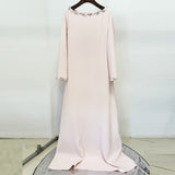 blush pink long sleeve kaftan-style maxi dress