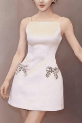 kelly rhinestone bow satin strappy mini dress in pink