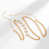 PEARL CROSSOVER CHEST BODY CHAIN IN GOLD blingmyfriend 
